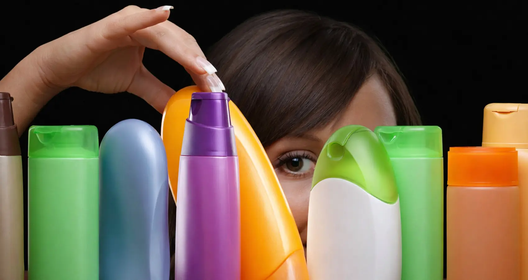 woman chooses shampoo